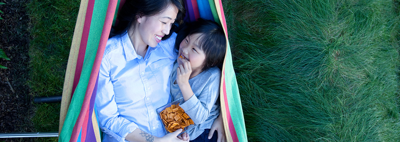 Adult and child having Annie's graham crackers